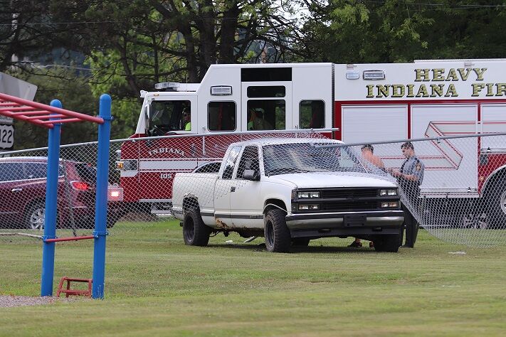Pickup through fence